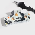 Close-up of Halloween hair claw clip with spooky skull, pumpkin, and bat patterns - White Bat Skull