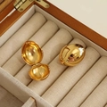Exaggerated gold oval hoop earrings with high-polish finish in a velvet box - Gold