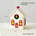 Mini white ceramic Christmas house with red chimney and wreath, glowing LED holiday decor - Red Forest House D