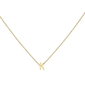 Detailed close-up of 18K gold letter K pendant necklace with polished finish and O-chain - Gold K