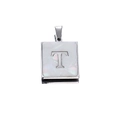 Macro detail of a square stainless steel letter T pendant with white mother of pearl inlay - Steel T