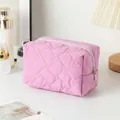 Pink quilted floral makeup bag with soft nylon texture and diamond stitch design - Irregular Quilted Light Purple