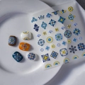 Détails d'autocollants 5D bohèmes avec motifs floraux géométriques sur cinq faux ongles - Style Géométrique Bohème (TS-074)
