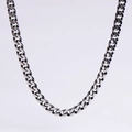 Macro detail of polished silver cuban link chain with reflective metallic texture - 5mm Vintage Silver