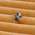Macro detail of royal blue marquise zircon flower stud with golden screw back - Five-petal Marquise Flower (E1233-7)