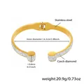 Detail of stainless steel cuff bracelet with sparkling pavé crystals and spring clasp - Gold Bangle (Z099)