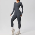 Detailed view of high-elasticity dark grey yoga set with long sleeve top and leggings - S / Top And Bottom / Graphite Grey