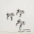 Ciondolo a fiocco in acciaio inossidabile argento per gioielli fai da te 22x24mm - Fiocco di nastro
