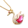 Exquisite golden swan pendant necklace featuring a large faceted pink crystal and white stones - Pink Swan