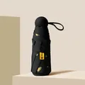 Obsidian black portable mini sun umbrella with gold heart patterns and UPF50+ tag - Obsidian Black (Heart Large)
