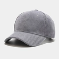 Close-up of classic six-panel grey corduroy baseball cap showing fine fabric texture - Gray