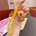 Cartoon brown bear keychain in bread toast costume with yellow braided lanyard - Toast Hat PVC