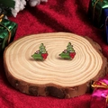 Festive Christmas holly leaf and red berry stud earrings on a wooden display base - Holly Leaves