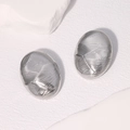 Pendientes ovalados de acero inoxidable plateado con acabado de metal cepillado texturizado - Color Acero