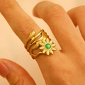 Detail of 18K gold-plated wavy band ring featuring a sunflower motif with green zircon - 4818k Pure Gold 8164