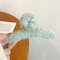 Large mint green plush hair claw clip for women featuring soft faux fur texture - Mint Green Plush Hair Claw
