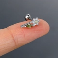 Silver zircon flower cartilage stud with olive green marquise stone on fingertip - CC128-1 Silver Flower Leaf
