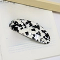 French style hair barrette with black and white marble acetate texture on book - Cow Print