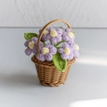 Handmade crochet purple flower in brown wicker basket, creative knitted tabletop decor - Puff Flower Purple