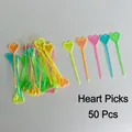 50-piece pack of colorful heart-shaped plastic fruit picks for parties and snacks - Heart Shapes (50 Pcs)