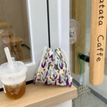 Floral drawstring storage bag with tulip prints on beige fabric for travel organization - Tulip Blue Branch