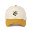 Close-up of smiley sunflower embroidery on cream and yellow patchwork baseball cap - Beige/Yellow