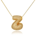 Detailed macro view of golden bubble letter Z pendant encrusted with white crystals - Letter Z (D1079-Z)