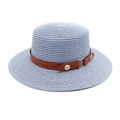 Detail of light blue woven straw hat with brown leather band and gold metal buckle - M (56-58cm) / Sky Blue