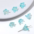 Set of seven light blue iridescent lily flower glass beads for DIY jewelry making - 20 Pcs/Pack / Peacock Green