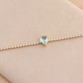 Collier élégant plaqué or avec pendentif goutte en zircon bleu clair et petits cristaux - Bleu clair