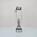 Glass water bottle featuring natural purple amethyst crystal hexagonal column inside - Amethyst Bottle