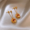 Polished gold knot drop earrings with high gloss finish on elegant silk fabric - Gold Knot Tassel Stud Earrings