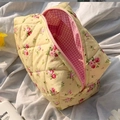 Quilted floral cosmetic bag in yellow with pink flowers and a zip closure - Yellow No-edge Floral