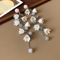 Detail of lily of the valley tassel earrings with pearls and grey textured beads - Lily of the Valley Shape Pearl Tassel Style (13# Silver Earring Post - White)