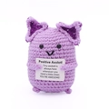 Miniature purple crochet axolotl plush holding a motivational card for desk decor - Fat Axolotl Purple Body P Card