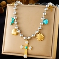 Detail of multi-layered beaded necklace with gold cross and turquoise heart pendants - Turquoise/Cross/Sunflower Style (N3250)