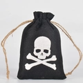 Black burlap Halloween drawstring gift bag featuring a white skull and crossbones print - Black Skull