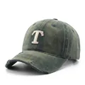 Vintage washed dark green baseball cap with distressed brim and ivory embroidered T logo - Dark Green