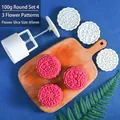 Detail of 100g round mooncake press with three flower stamp patterns and handle - Round Set 4 (3 Patterns)