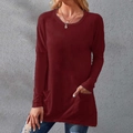 Detail of wine red crew neck long sleeve top showing side pockets and loose fit texture - S / Tops / Burgundy
