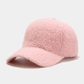Texture dettagliata del berretto rosa in lana d'agnello che mostra il pile morbido e caldo - Rosa