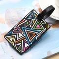Black PVC luggage tag featuring a colorful geometric triangle pattern and adjustable strap - Colorful Triangle