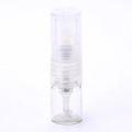 Macro shot of 1ml clear glass perfume atomiser with spray pump and thick base - 1ml / Clear