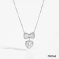Collana d'argento con pendente a fiocco e cuore con zirconi su sfondo bianco puro - Collana d'Argento(PD1568)