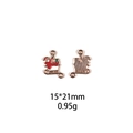 Detailed macro view of 15x21mm Santa Claus sleigh alloy charm in red and gold enamel - Style 7-Santa Sleigh