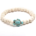Howlite beaded elastic bracelet featuring a green turtle charm for beach vacation style - Synthetic White Turquoise (NL04-5)