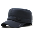Detail view of navy quilted flat cap featuring ear flaps and SPORTS print on brim - Adjustable / Navy Blue