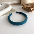 Detail of teal sponge headband with textured fabric on an elegant ins-style background - Dark Green