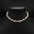 Baroque pearl necklace with gold chain and cluster pearls on a black velvet neck bust - Baroque Irregular Pearl Set Necklace