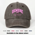Distressed dark grey cotton baseball cap with Demure slogan print and bow design - Coffee